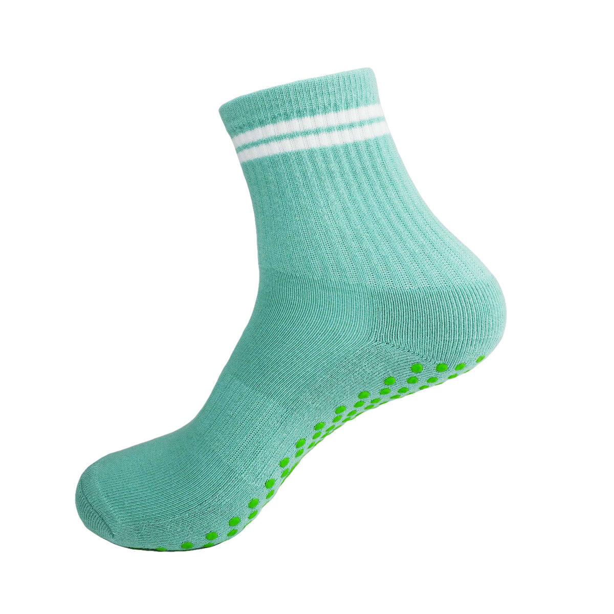 Green and white GRIPTEC pilates grip socks, side view