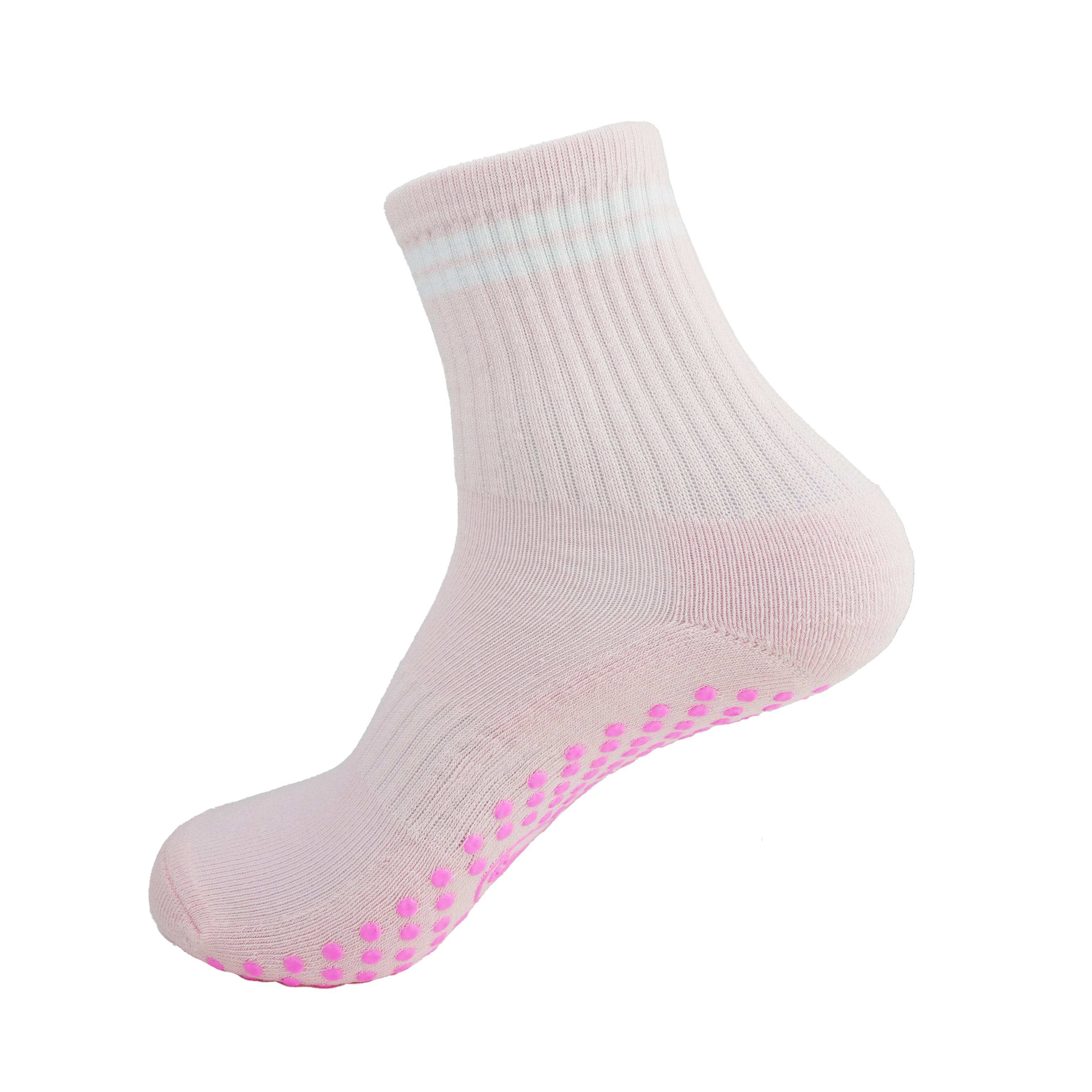 Pink and white GRIPTEC pilates grip socks, side view