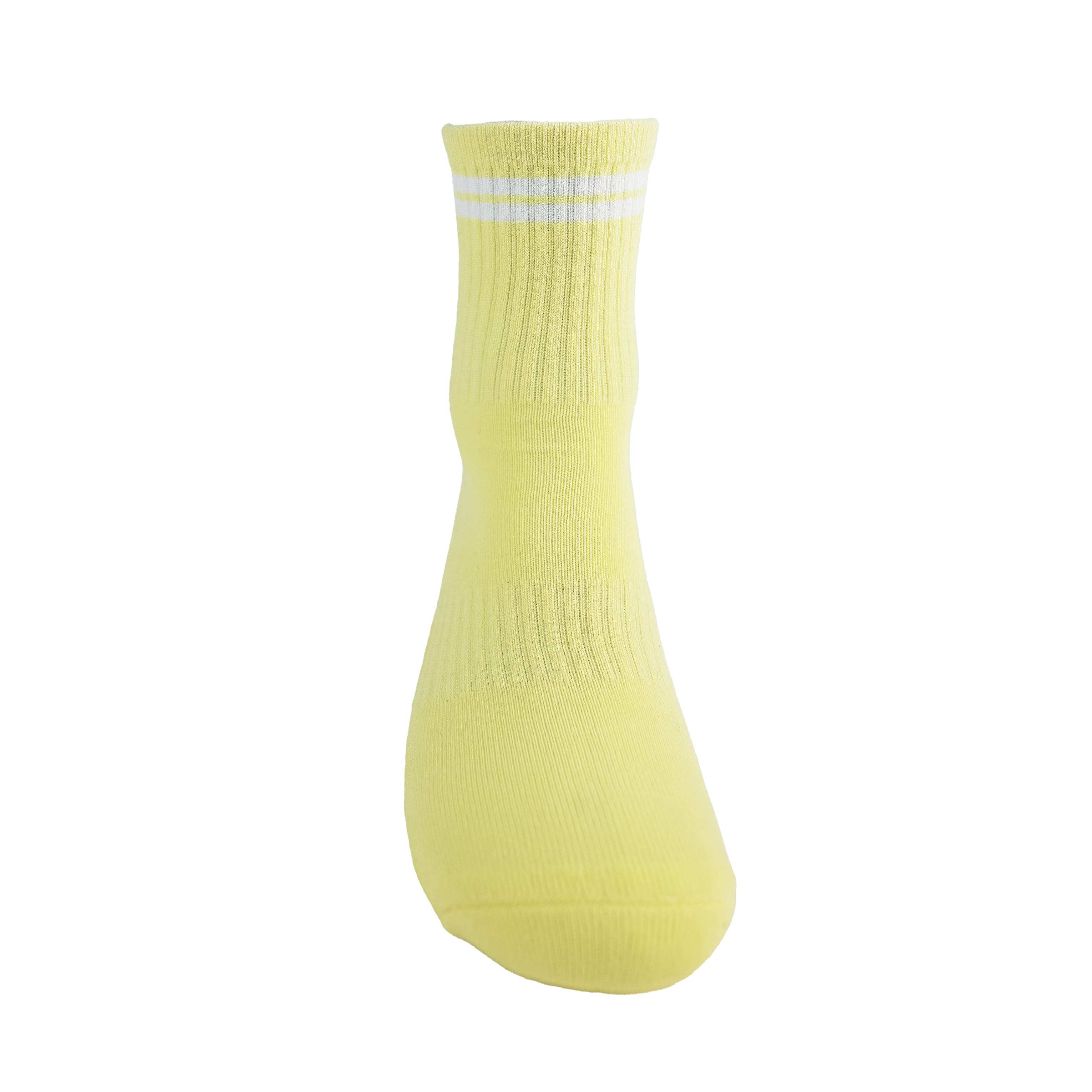 Yellow and white GRIPTEC pilates grip socks, front view