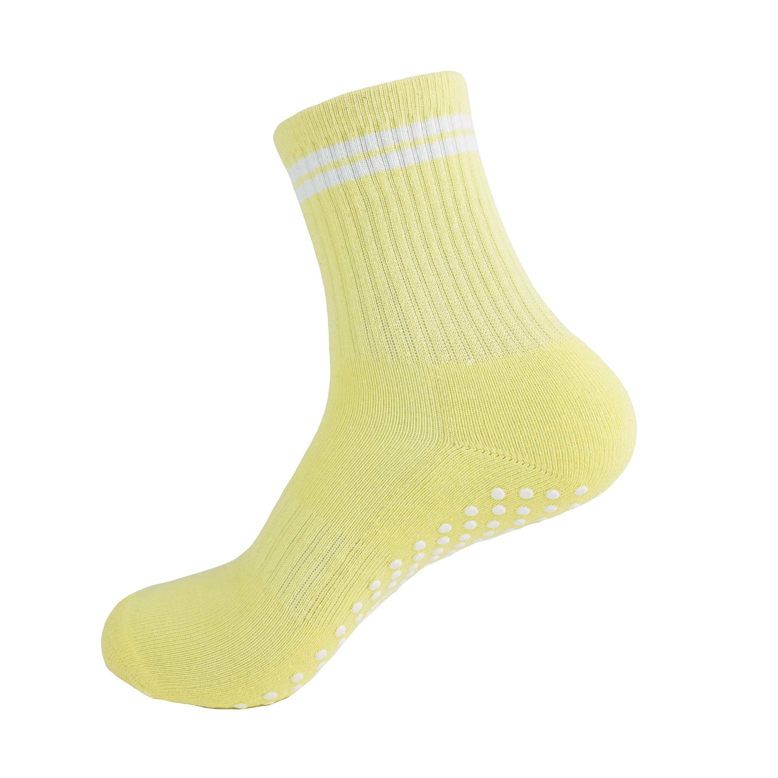 Yellow and white GRIPTEC pilates grip socks, side view