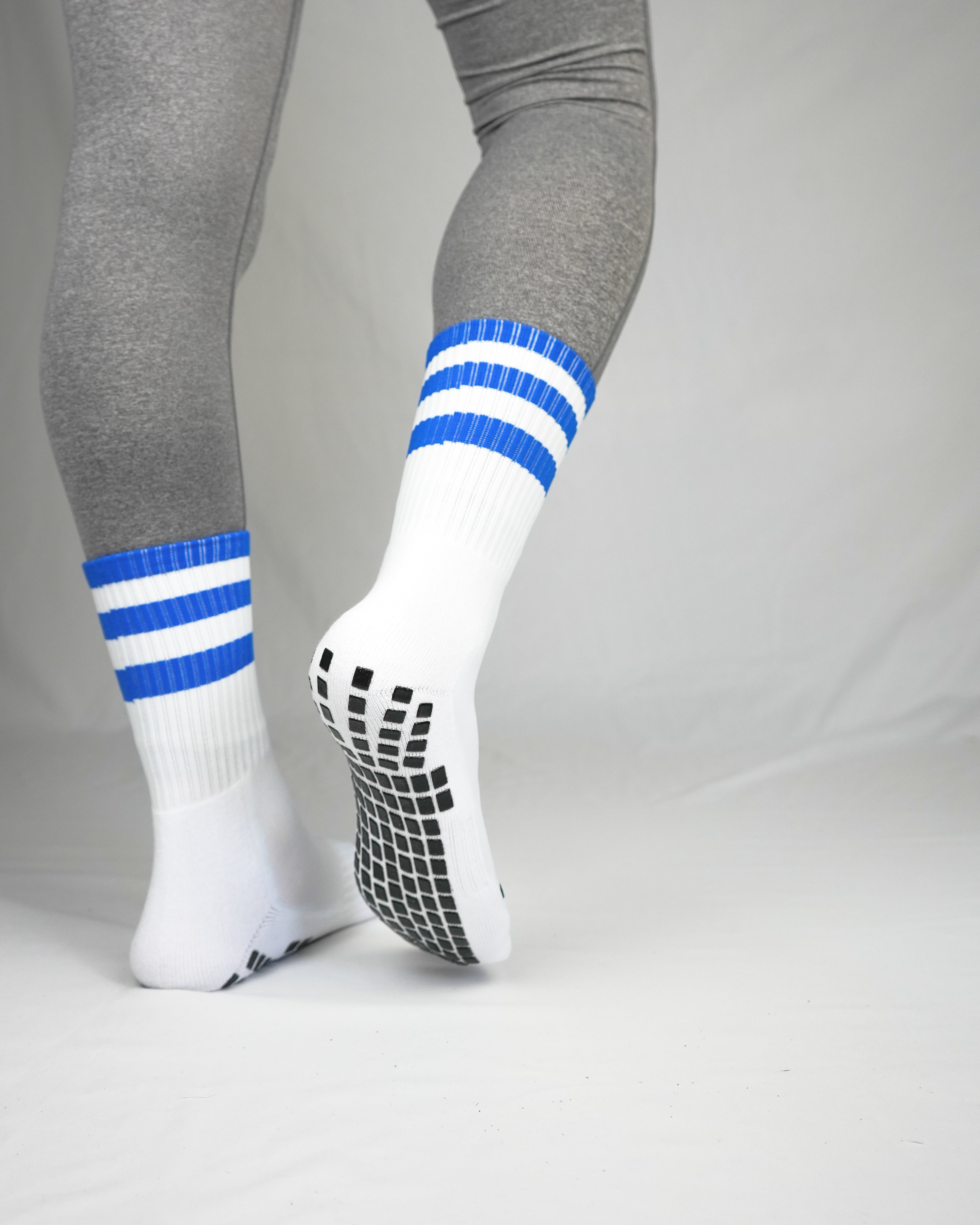 Blue and white Griptec grip socks pictured from the back