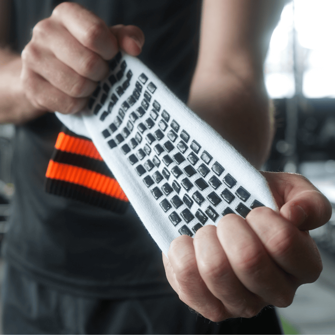 black and orange grip socks