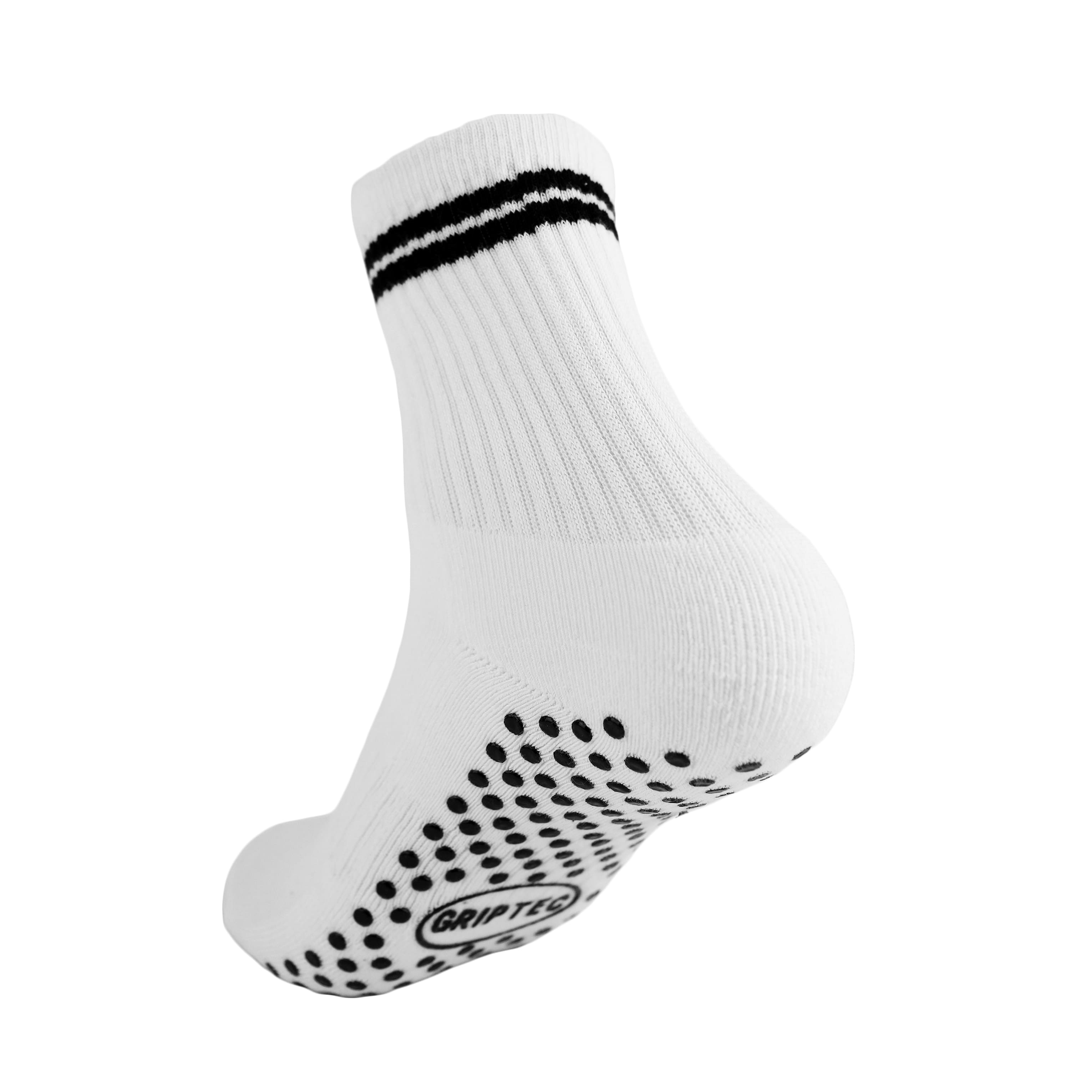 White and black GRIPTEC pilates grip socks, back view showing the non-slip sole